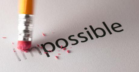 Eraser removing the “im” from “impossible,” turning it into “possible,” symbolising overcoming self-doubt and achieving success.
